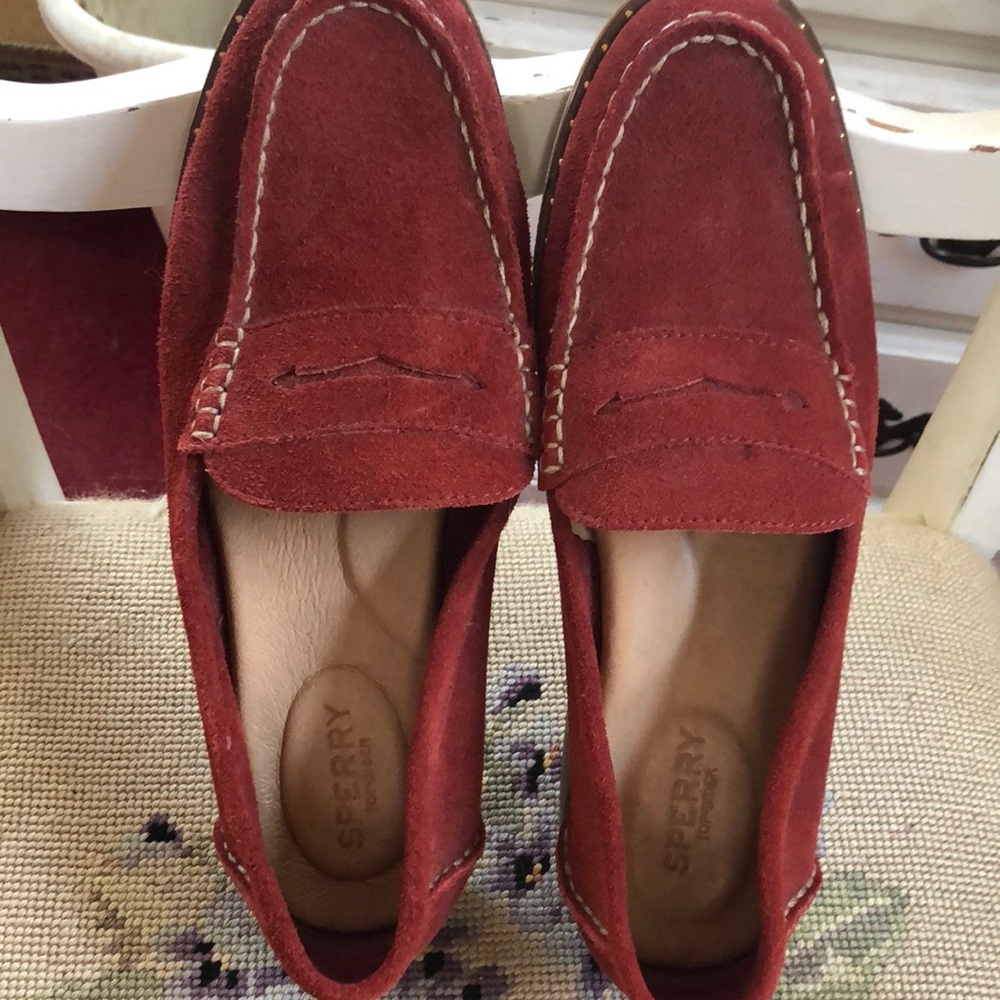 Dark red suede Sperry loafers.